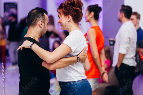 Kharkiv, Ukraine 17.08.21 People dancing bachata on the dance floor photo