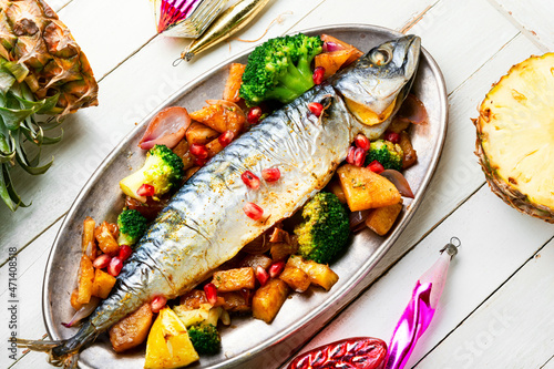 Baked fish with pineapple for Christmas photo