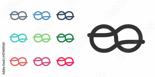 Black Nautical rope knots icon isolated on white background. Rope tied in a knot. Set icons colorful. Vector