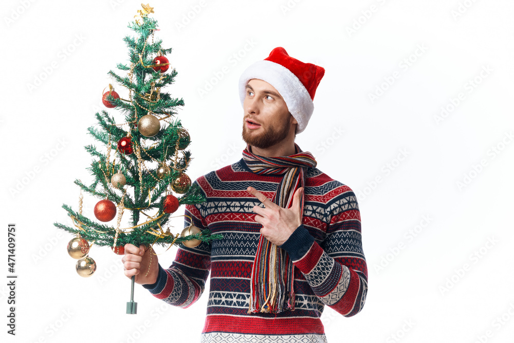 handsome man in a santa hat Christmas decorations holiday New Year isolated background handsome man in a santa hat Christmas decorations holiday New Year isolated background