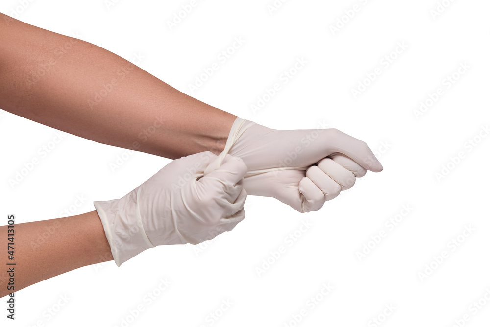 Stretching latex gloves on woman hands, isolated
