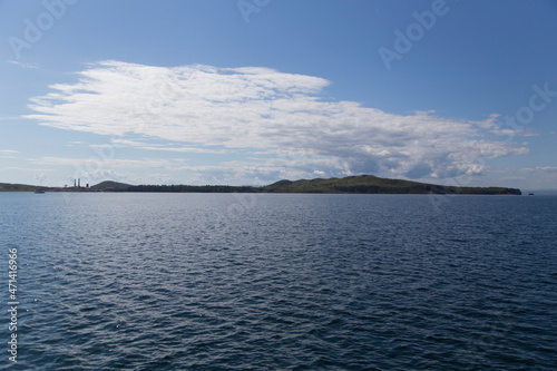 day view of the sea  islets  capes  white clouds and blue sky in the Novik harbor on island Russky in Vladivostok  Russia