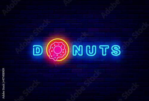 Donuts neon signboard. Shiny emblem for bakery. Sweet bar. Night bright logo. Isolated vector stock illustration