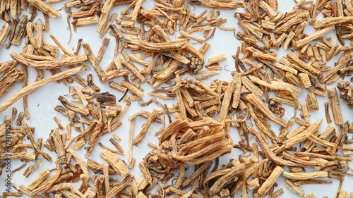 top view herb LongDan or Gentianae Radix et Rhizoma or Chinese Gentian Root rotating