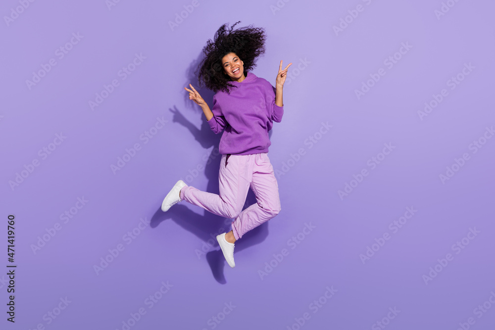 Full body photo of excited cheerful lady two arms make v-sign greetings hello symbol isolated on purple color background