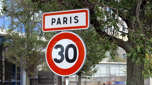 Paris entrance traffic sign with a speed limit for cars of 30 kilometers per hour