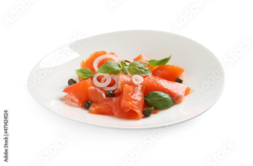 Delicious salmon carpaccio with capers, basil and onion on white background