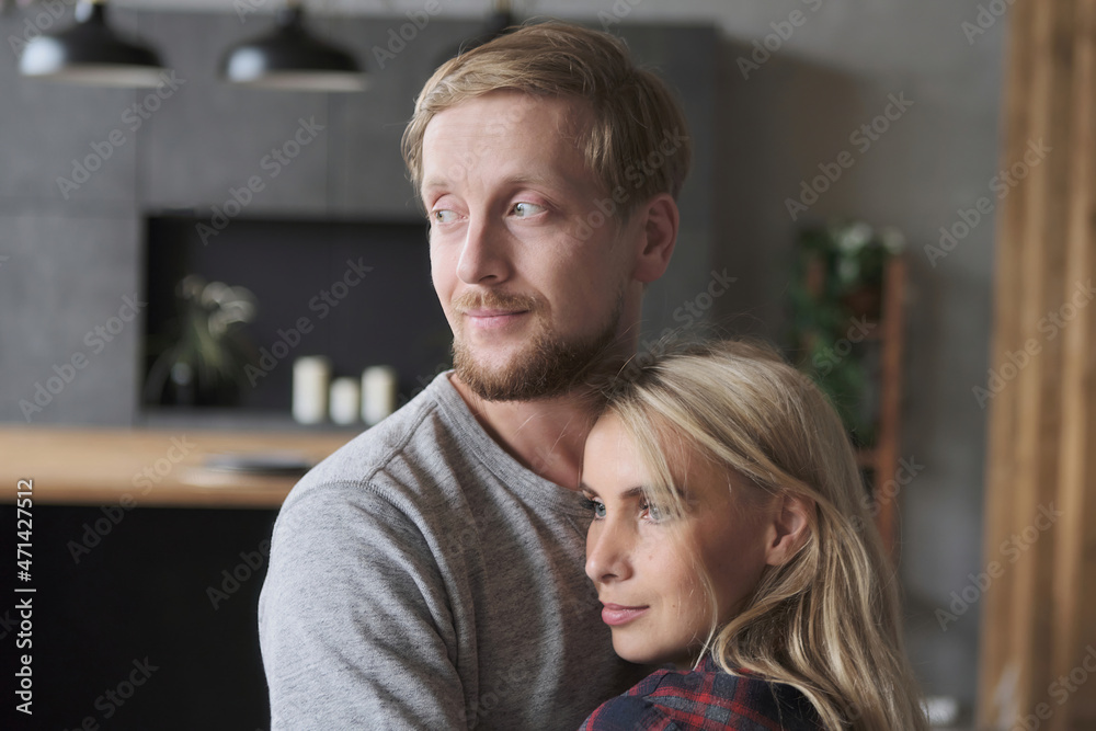 Enamored husband and wife embracing taking care support with best love feeling at luxury apartment close up. Cute family relaxing enjoying weekend spending time together at home tender relationship Enamored husband and wife embracing taking care support with best love feeling at luxury apartment close up. Cute family relaxing enjoying weekend spending time together at home tender relationship