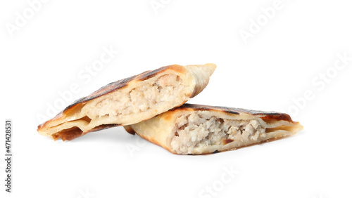 Cut fried cheburek isolated on white. Traditional pastry