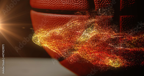 Image of glowing orange particles moving over basketball