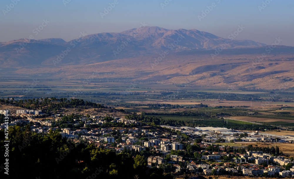 View of Mount Hermon, the Golan Heights, and Hula Valley below as seen from Mount Kana'an above Rosh Pina, Upper Galilee, Northern Israel, Israel. 