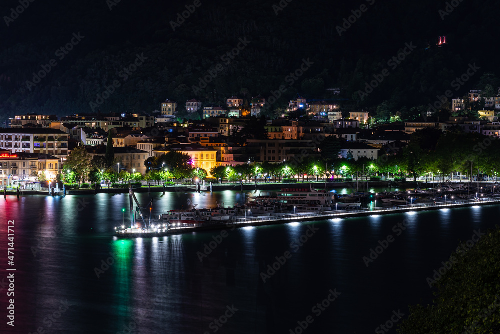 Panorama of the lakefront of Como, and of the outer dam with the Life Electric monument, in a summer evening. 