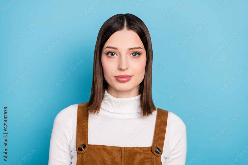 Photo of young charming lady good mood clever wear casual outfit isolated over blue color background Photo of young charming lady good mood clever wear casual outfit isolated over blue color background