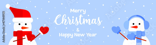Two snowmen on a blue snowy background point to the greetings of Christmas and New Year. Festive greeting banner. Flat vector illustration