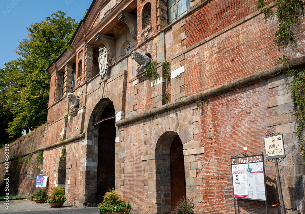 Lucca, Tuscany, Italy. August 2020. Beautiful external view of the San Pietro access gate to the historic center through the defensive walls. Beautiful summer day.