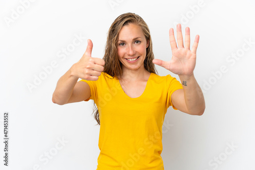 Young caucasian woman isolated on white background counting six with fingers © luismolinero