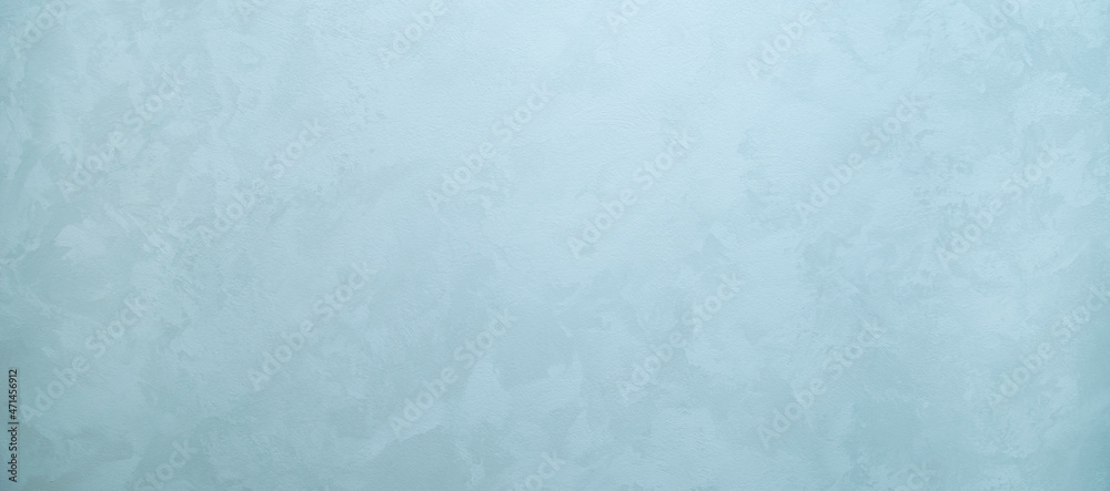 The texture of decorative plaster under silk. Abstract gray-blue mother-of-pearl background with space for text