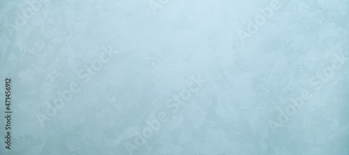 The texture of decorative plaster under silk. Abstract gray-blue mother-of-pearl background with space for text