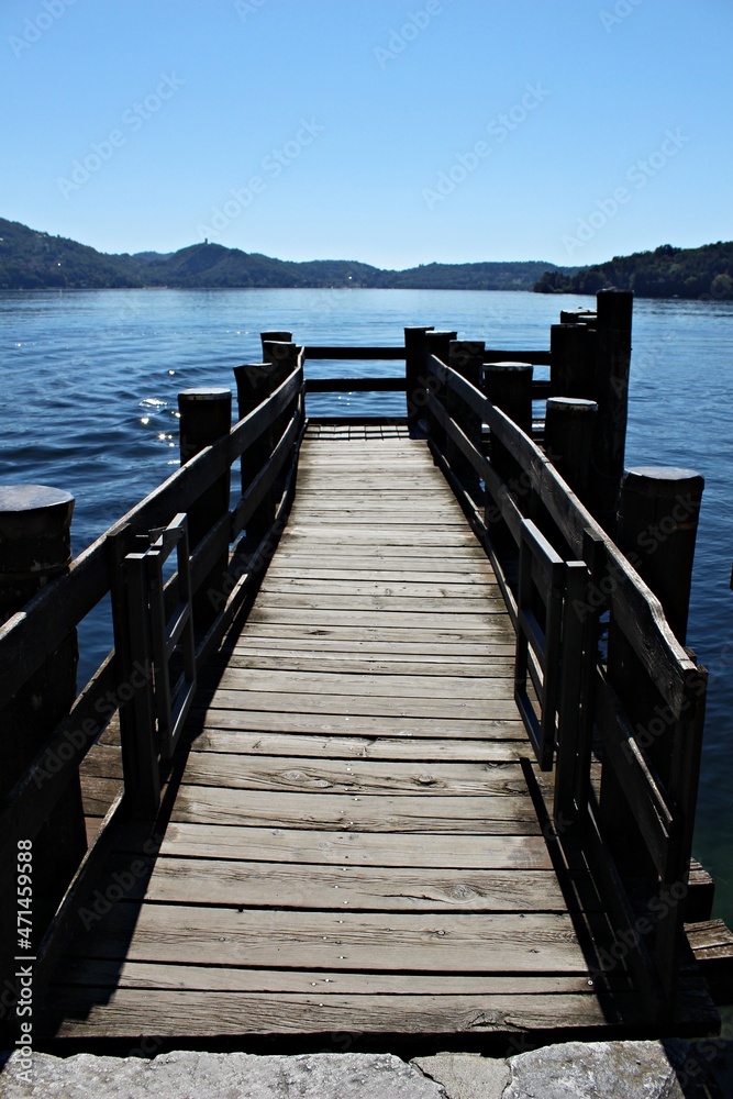 Obraz premium Italy: Wooden jetty on the Orta Lake.