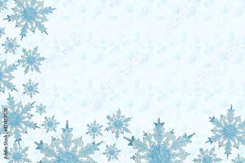 Blue snowflake frame on light blue background
