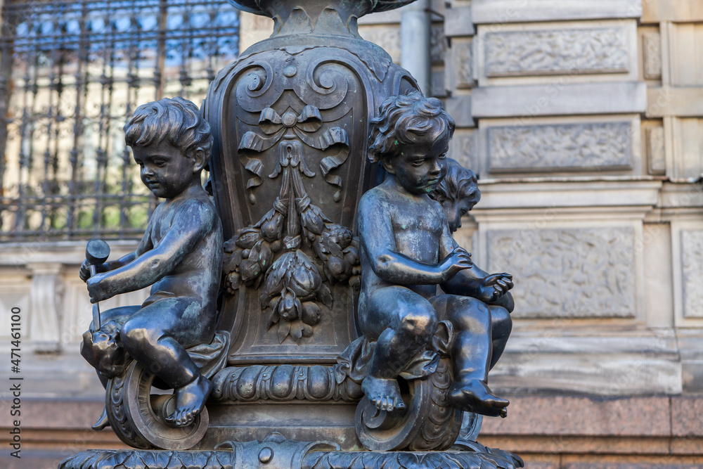Fototapeta premium Details of decorations of street lamps at the Stieglitz Academy in St. Petersburg in the form of seated putto