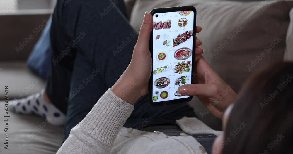 woman searching food on food mobil applications