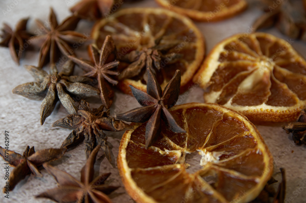 Christmas background of dried fruits and spices. dried, orange, and stars texture background Christmas background of dried fruits and spices. dried, orange, and stars texture background