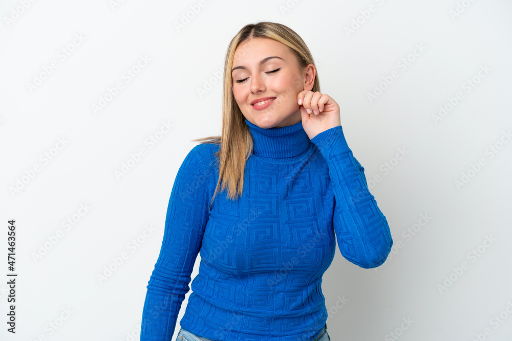 Fototapeta premium Young caucasian woman isolated on white background laughing