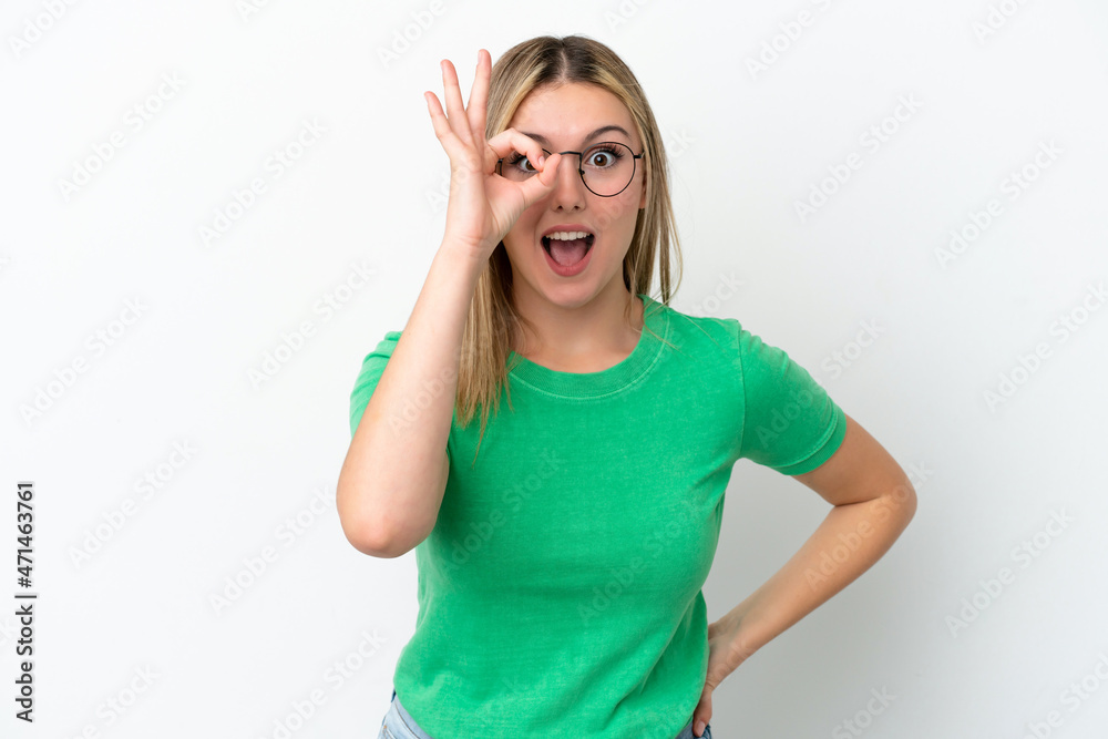 Young caucasian woman isolated on white background showing ok sign with fingers