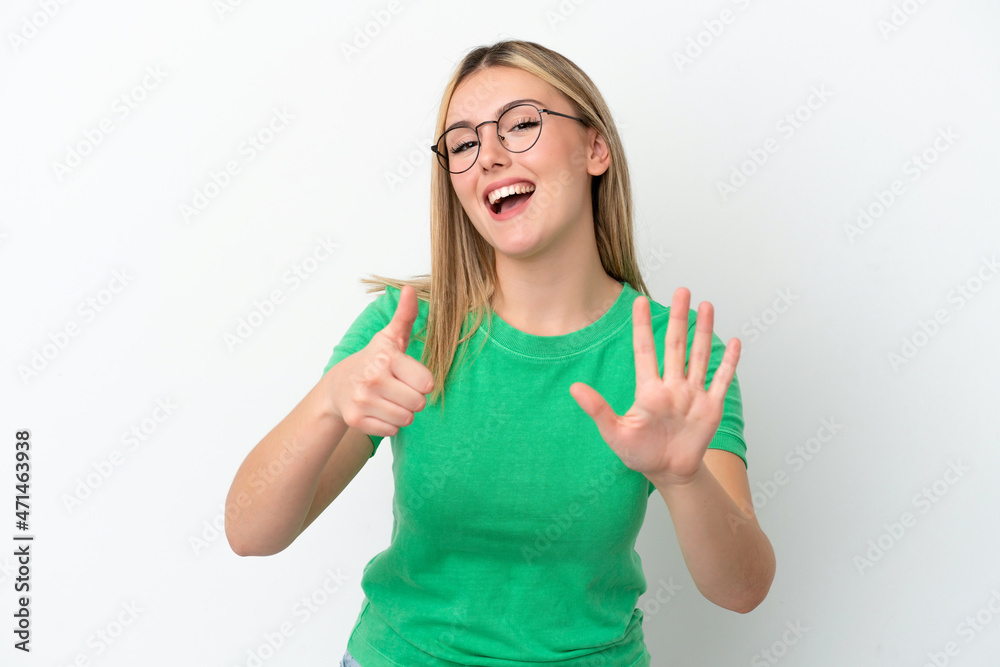Young caucasian woman isolated on white background counting six with fingers Young caucasian woman isolated on white background counting six with fingers