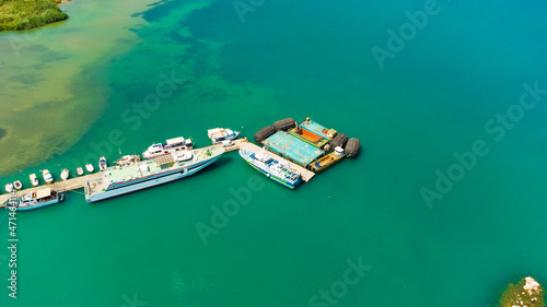 Greek fishing boats on turquoise sea water in Posidonio bay, Samos island, Greece