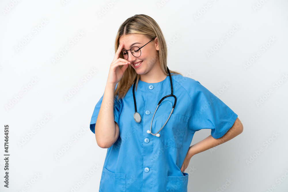 Young surgeon doctor woman isolated on white background laughing Young surgeon doctor woman isolated on white background laughing