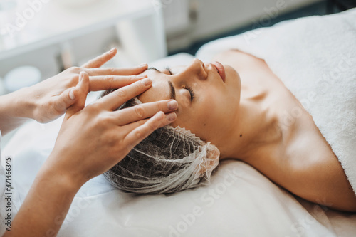 Photography Closeup portrait of a woman in spa salon getting face treatment