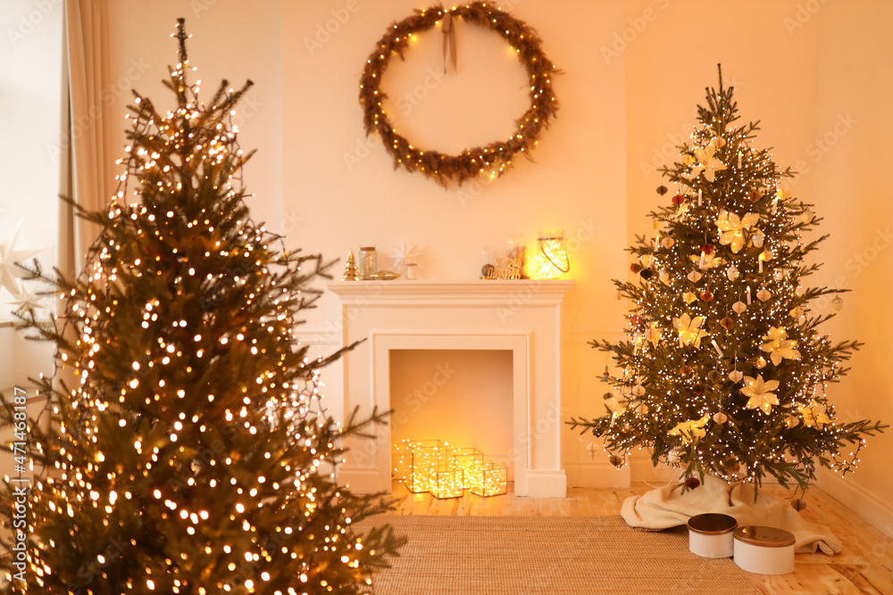 Christmas interior of a decorated living room with a wooden rocking horse and a Christmas tree in a cozy house on New Year's Eve at night. Selective focus Christmas interior of a decorated living room with a wooden rocking horse and a Christmas tree in a cozy house on New Year's Eve at night. Selective focus