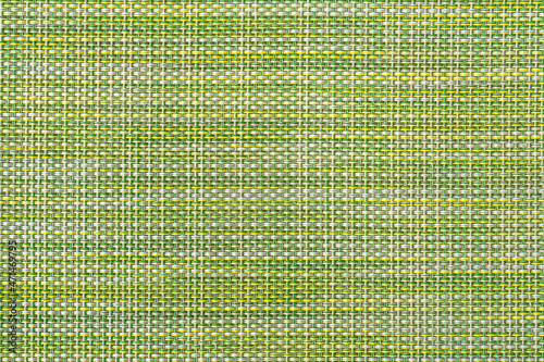 wicker texture of green, yellow and white threads