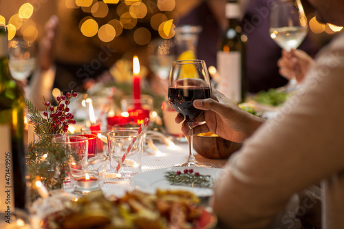 Canvas Print holidays, party and celebration concept - close up of man having christmas dinne