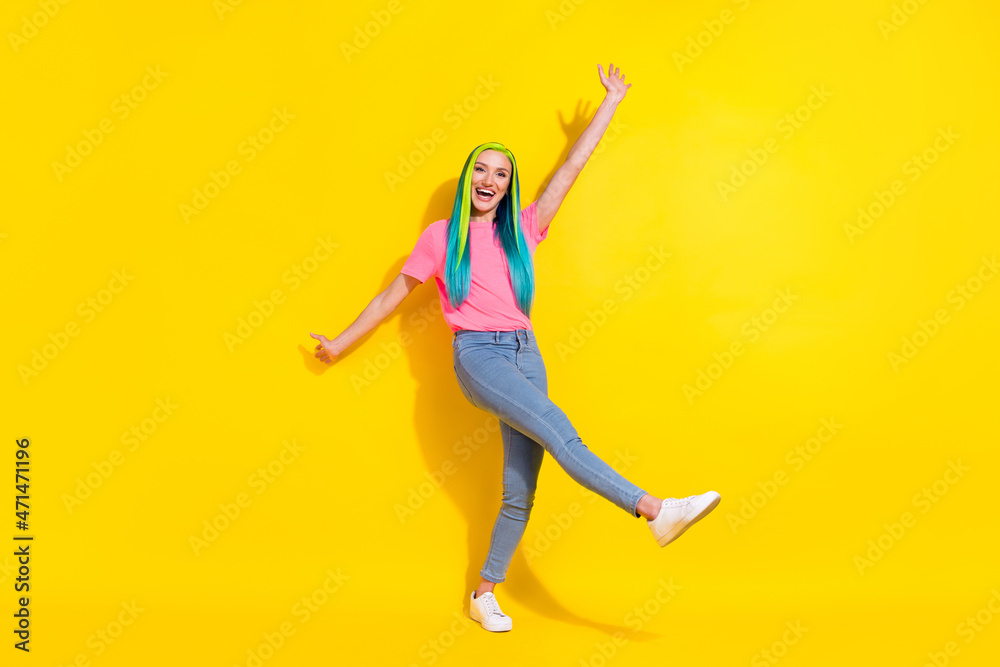 Full length body size view of attractive cheerful funny girl dancing having fun isolated over bright color background Full length body size view of attractive cheerful funny girl dancing having fun isolated over bright color background