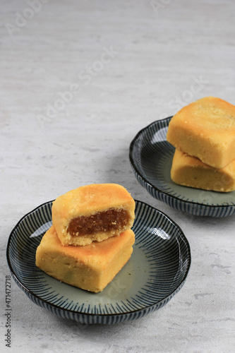 Photography Pineapple Cake Pastry, Taiwanese Famous Sweet Delicious Dessert Food (Nastar Taiwan or Nastar Hongkong) with Tea, Copy Space Design