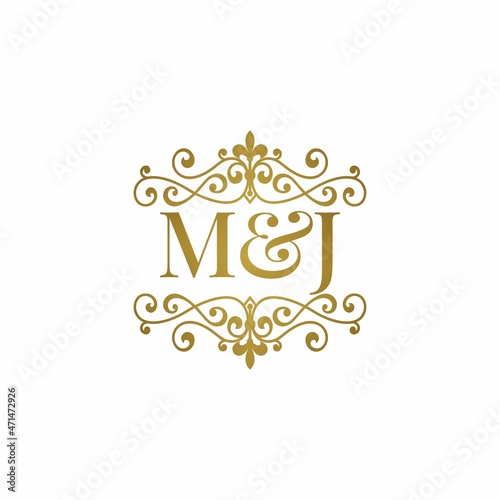 M&J initials logo ornament gold. Letter MJ wedding ampersand or business partner symbol.	
 photo