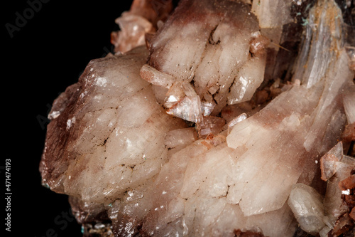 Macro of a stone Albite mineral on a black background photo