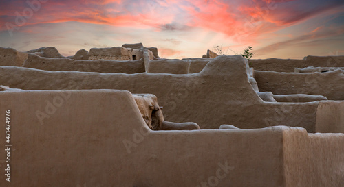 Beautiful sunset in ad Diryah over the roofs of mud houses photo