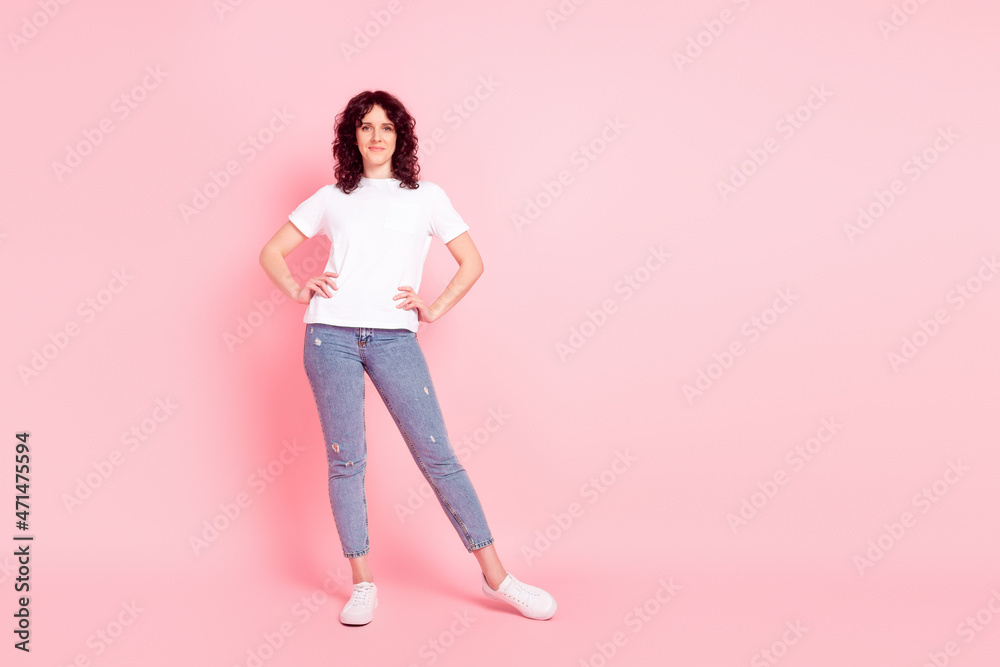 Full body photo of young charming woman arms on waist wear casual outfit isolated over pink color background Full body photo of young charming woman arms on waist wear casual outfit isolated over pink color background
