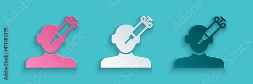 Paper cut Addiction to the drug icon isolated on blue background. Heroin, narcotic, addiction, illegal. Sick junkie with a syringe and medical pills. Paper art style. Vector