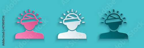Paper cut Concussion, headache, dizziness, migraine icon isolated on blue background. Paper art style. Vector