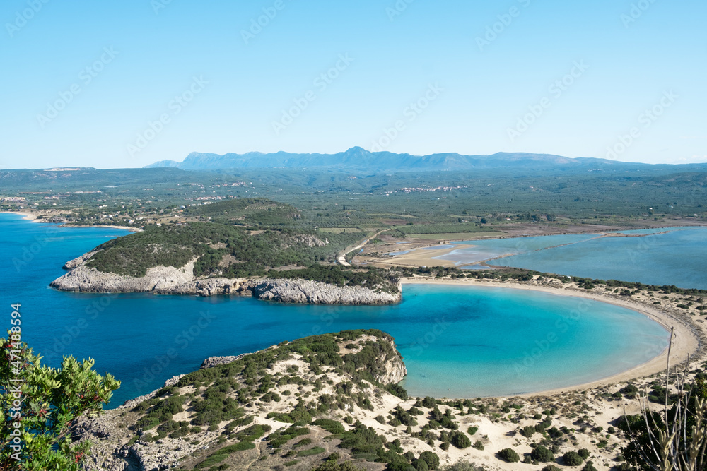 Beautiful sandy beach, bay landscape, lagoon Voidokilia beach in Greece,outside Pylos, Peloponnese, Ionic sea.Top view from Navarino castle.Beauty of nature.Copy space