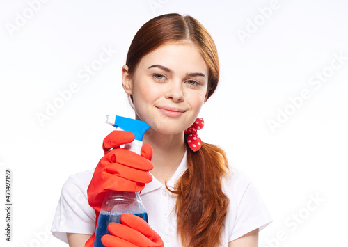 cheerful woman in red rubber gloves detergent washing windows