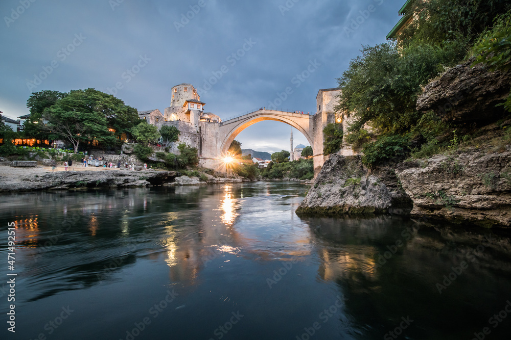 Mostar medieval ottoman stone bridge in Bosnia and Herzegovina in Balkan over Neretva river