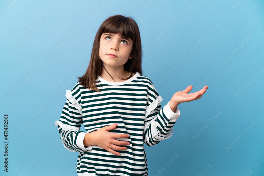 Little girl over isolated background having doubts Little girl over isolated background having doubts