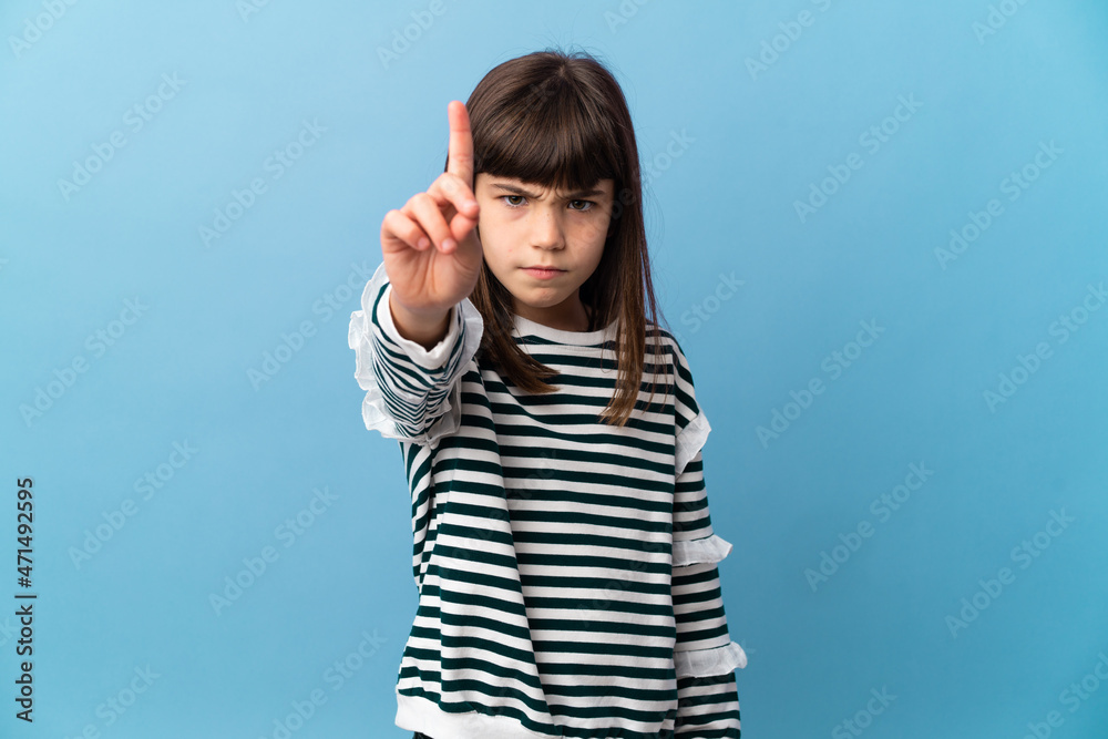 Little girl over isolated background counting one with serious expression Little girl over isolated background counting one with serious expression