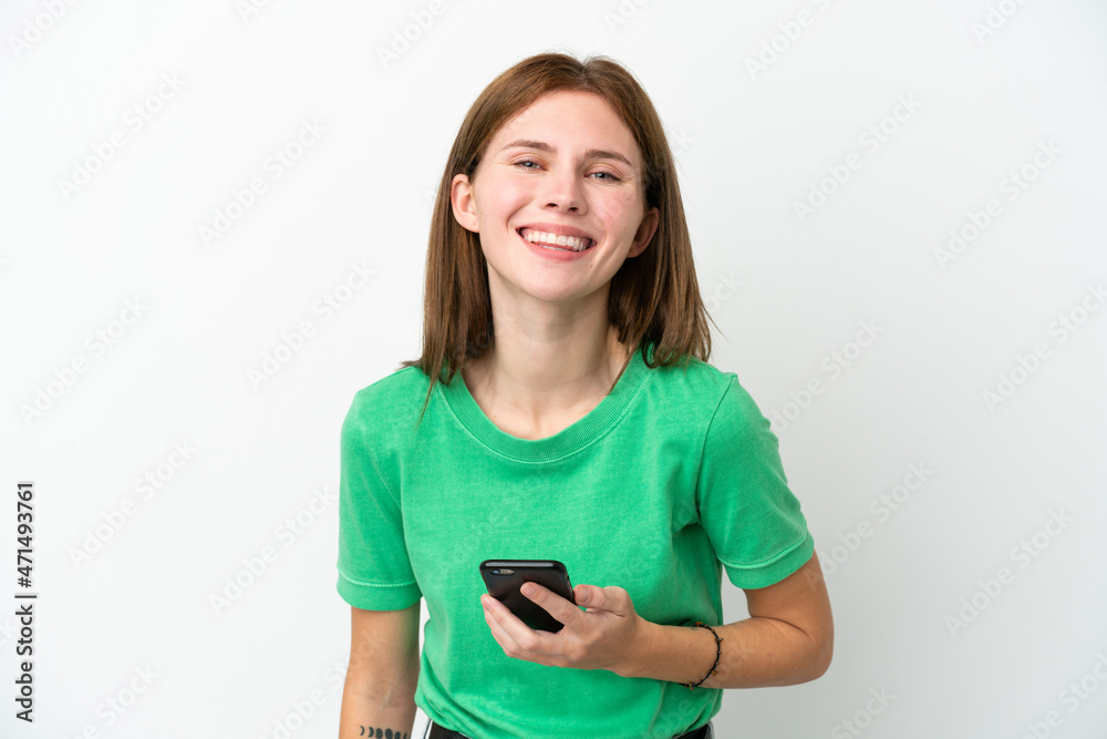 Young English woman isolated on white background using mobile phone Young English woman isolated on white background using mobile phone